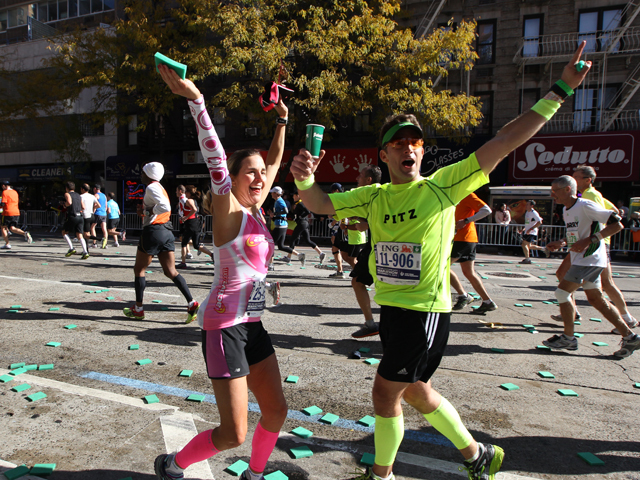 <p>Runners celebrate during this years NYC Marathon.</p>
