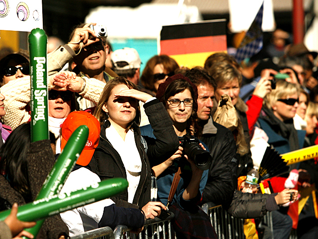 <p>Spectators watch as runners race by during this years New York Marathon.</p>
