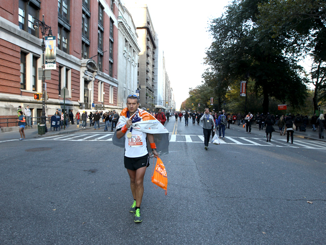 <p>A runner completes the NYC Marathon of 2011.</p>
