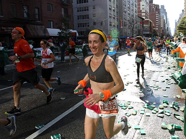 <p>Runners race for the finish line of the 2011 New York City Marathon.</p>
