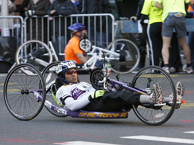 <p>An athlete competes in the New York City Marathon.</p>
