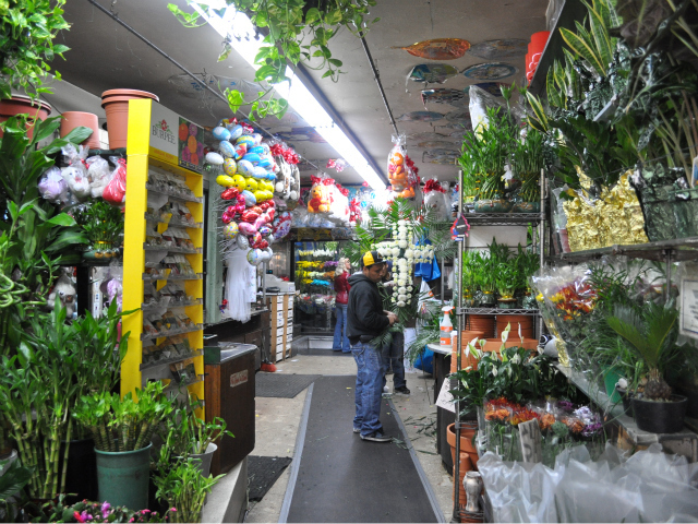 The narrow shop serves up hundreds of floral arrangements each week.