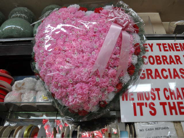 Zafiros consults with customers to identify the best flowers for customers.