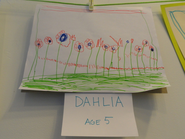 Dahlia, 5, draws flowers in her fantasy park, imagining a greener future for a now vacant lot at West 20th Street in Chelsea