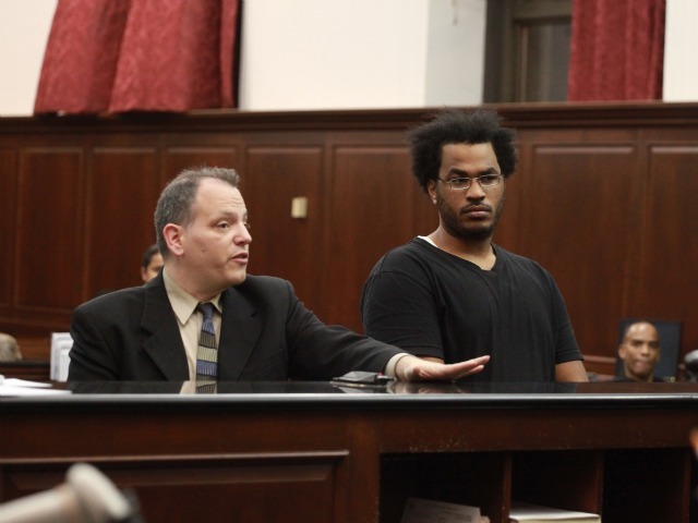 Jose Pimentel, right, appeared in Manhattan Criminal Court Sunday night with his attorney James Zabocki.