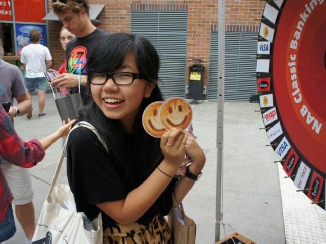 Fans of Pie Face pose at a promotional event.