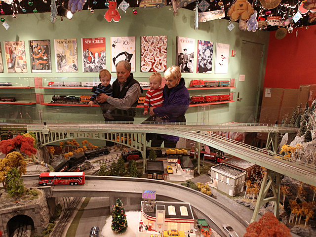 A family enjoys the Holiday Train Show at Grand Central Terminal over the Thanksgiving weekend, 2011.
