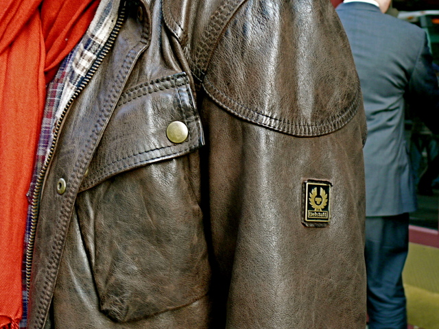 Details of Dushan K. in a very British Belstaff jacket in brown distressed leather.