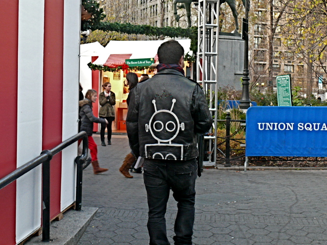 A fashion mis-step: a square, old-school gusset sleeve biker with club kid details in Union Square is defintely not on trend, and not the current biker jacket look.