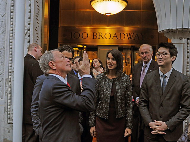 The scaffolding's designers watch Mayor Bloomberg check out it's leaky roof, Dec. 7, 2011. 