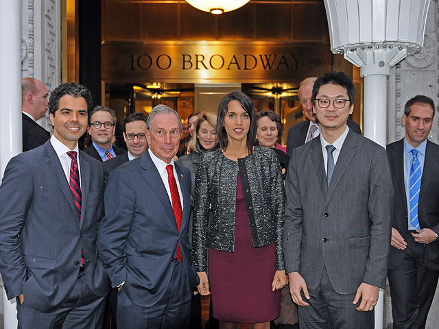 Mayor Bloomberg poses with the Urban Umbrellas designers, Andres, Cortes, Sarrah Khan and Young-Hwan Choi (left to right), Dec. 7, 2011. 