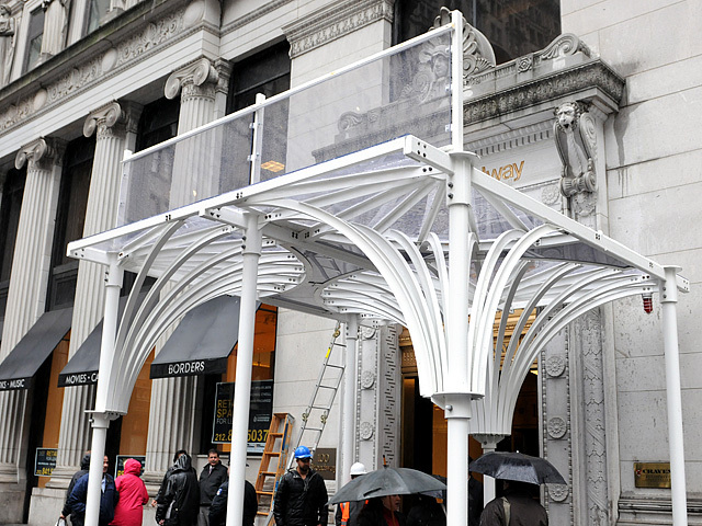 The Urban Umbrella is supposed to cost about the same as current scaffolding. 