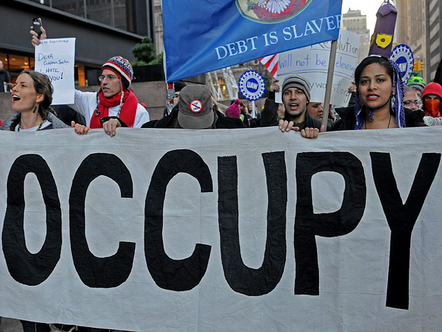 Occupy Wall Street protesters march to Goldman Sachs' global headquarters in lower Manhattan, Dec. 12, 2011. 
