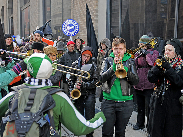 Occupy Wall Street protesters bring music into their march, Dec. 12, 2011. 