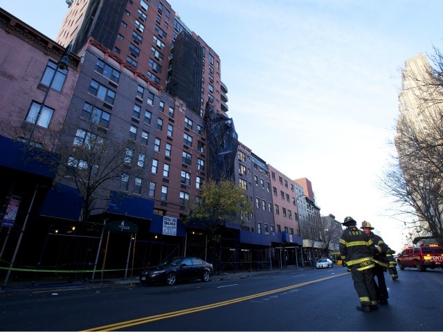 West 14th Street between Seventh and Eighth avenues was closed to traffic following the scaffolding collapse.