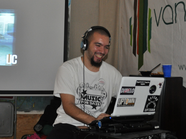 DJ Boy played music at the Word Up Rent Party Saturday, Dec. 17, 2011.