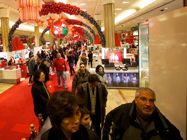 <p>Crowds pack into Macy's to do last-minute Christmas and holiday shopping on Dec. 24, 2011.</p>

