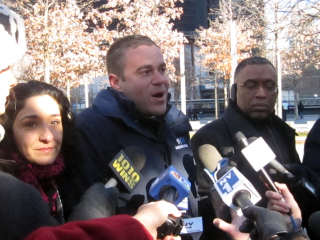 Joe Daniels, center, said the museum's construction is delayed. 