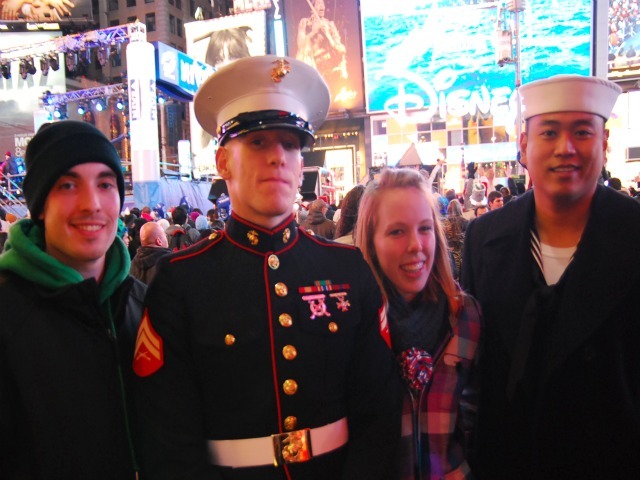 Donald Garrell, Jr., Cpl. Mike Basso, Kelly Wisnewski and Petty Officer 2nd Class Paolo Flores spent New Year's 2012 in the center of Times Square.