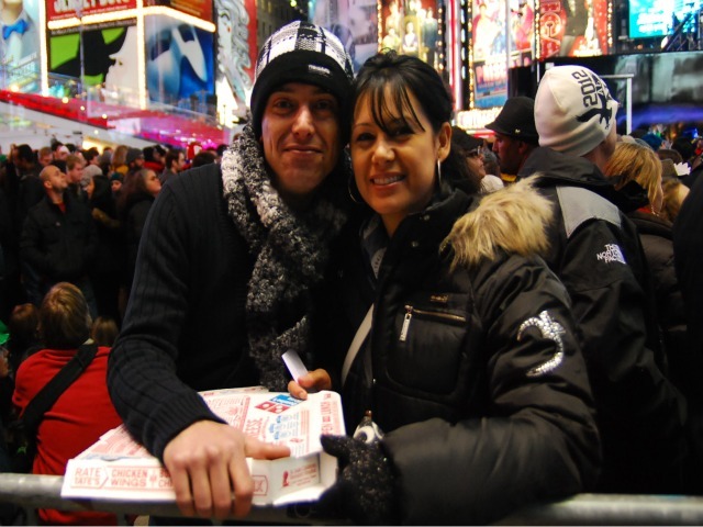 Massimo Coscarella and Claudia Hernandez came from Toronto to spend New Year's 2012 in Times Square. They spent $20 on a medium Domino's pizza because there were few other options.