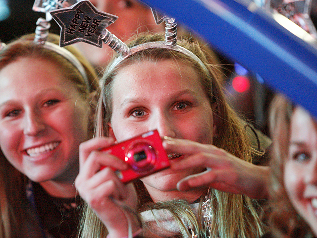 Revelers catch all the magic moments on New Year's Eve in Times Square, 2011.