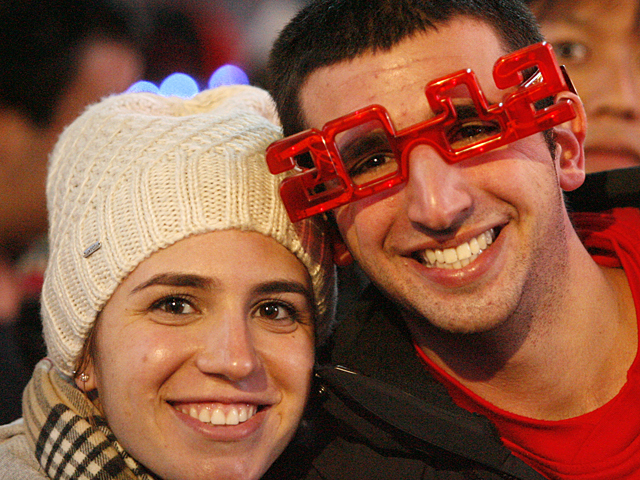 A couple celebrate New Year's Eve in Times Square, New York City, 2011.
