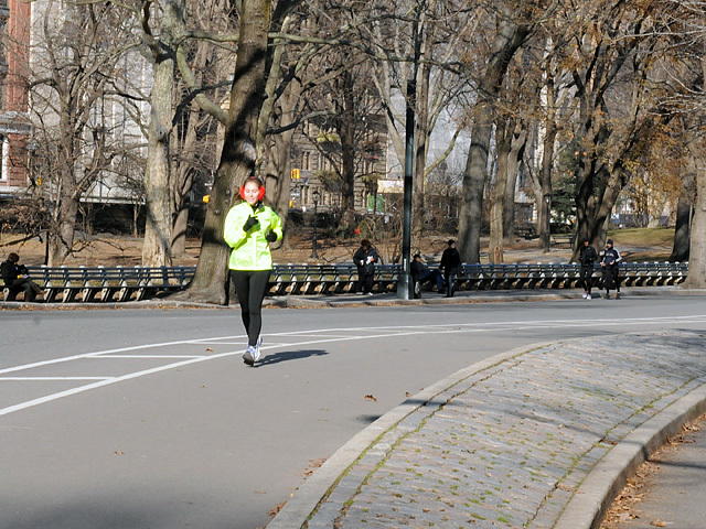 A runner wears ear muffs while running through Central Park on Jan. 5 , 2012. 