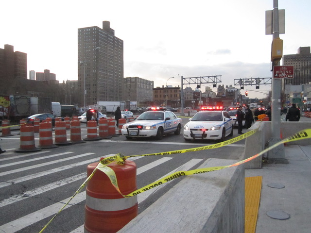 Police blocked off two lanes of Delancey Street where a 12-year-old girl was killed Jan. 13, 2012. 