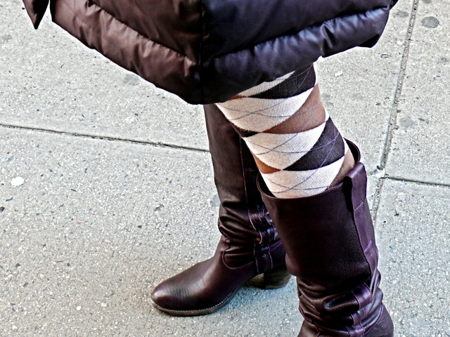 Argyle tights with flat boots and a down winter coat on University Place.