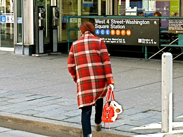 Bold red tartan and red accessories on Sixth Avenue in West Village.