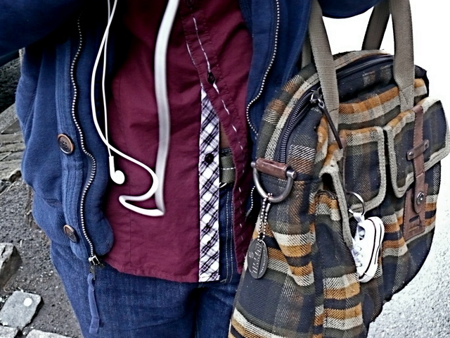 Detail of plaid tote in West Village, with bias plaid placket trim in West Village.