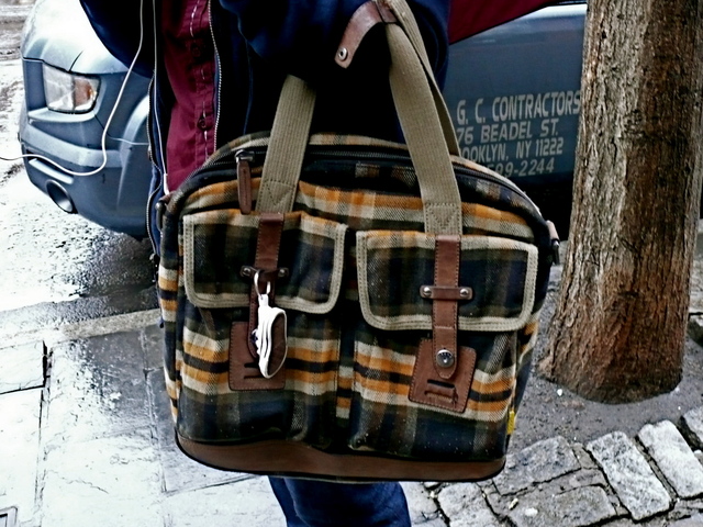 Big, bold plaid tote with canvas and leather details on Sixth Avenue, West Village.