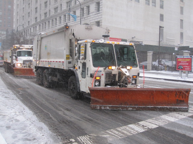 <p>Snowplows lined East 14th Street on Sat., Jan, 21, in preparation for the storm.</p>
