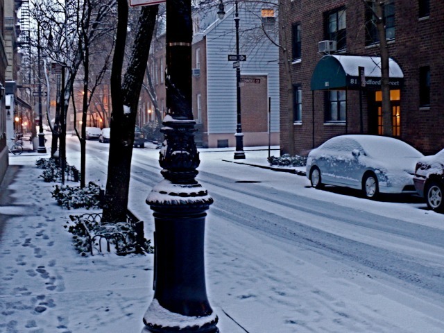 <p>Snow blanketed the corner of Bedford and Commerce streets in the West Village on Sat., Jan. 21, 2012.</p>
