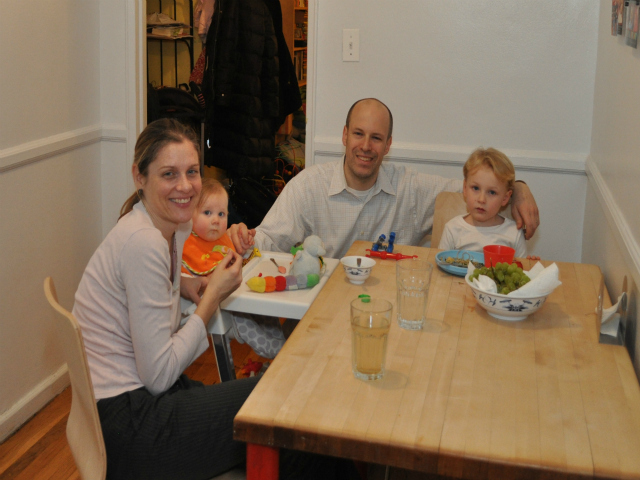 The Keithleys, Meredith (from left), Rosemary, Todd and Silas, sit in their Inwood apartment. They called the DEP to report brown water from their faucets.