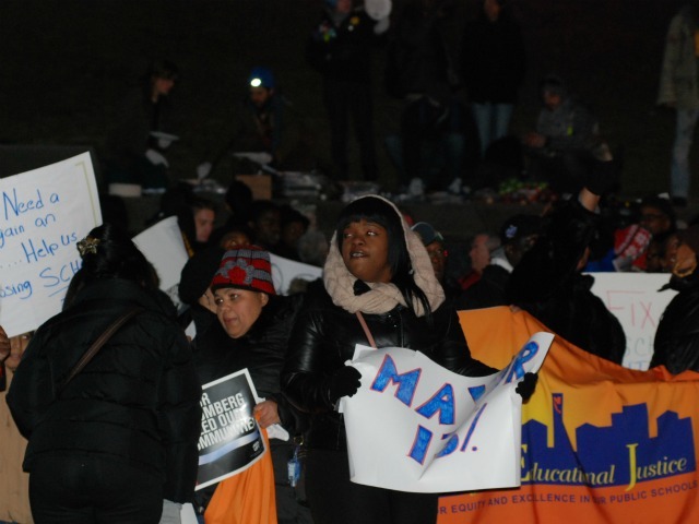 Protesters rallied in front of Brooklyn Technical High School ahead of the hearing Thursday night.