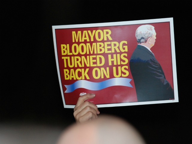A sign waved by a protester at a large rally ahead of the PEP vote.