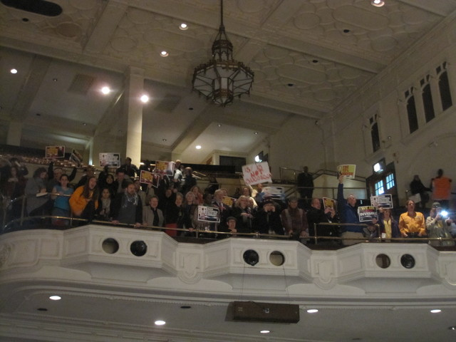 More than 2,000 people packed the room, mostly to express opposition to the closures.