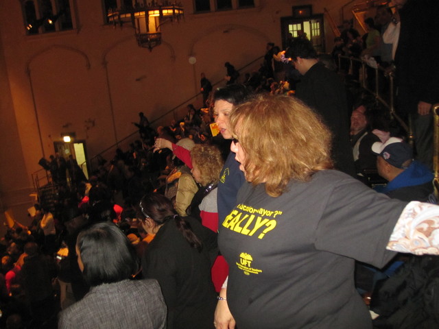 The meeting was heated, with hundreds hurling insults at the stage.
