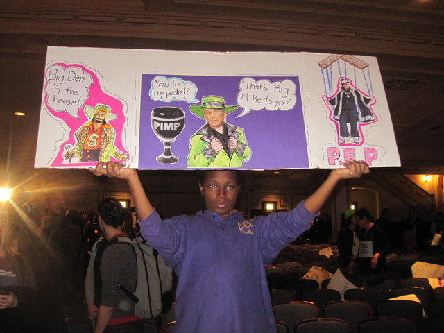<p>Twelve-year-old Joseph Mendinghall, who attends ABCD in Brooklyn, holds a sign protesting plans to close his school.</p>
