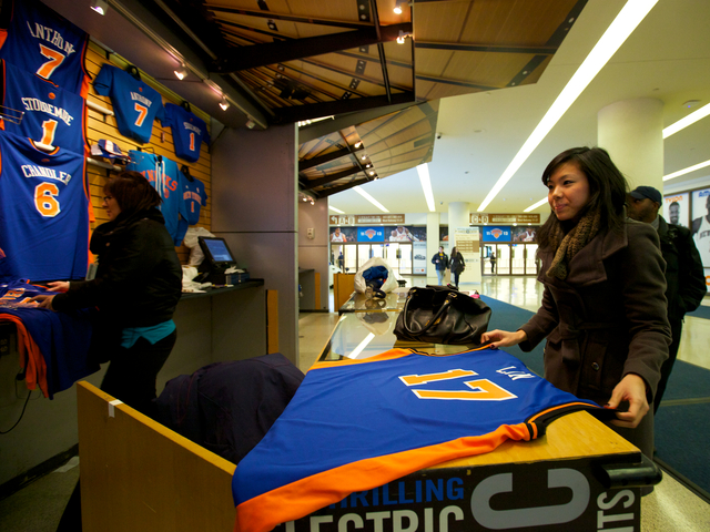 Michelle Wang, a Macy staff, purchases Lin's jersey for her boyfriend.