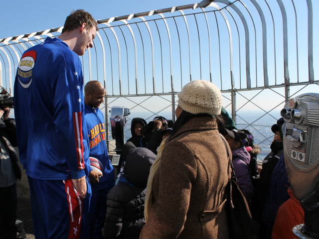 'Flight Time' Lang and 'Tiny' Sturgess greet kids from Garden of Dreams on top of the Empire State Building.
