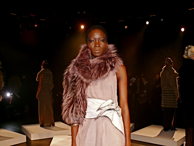A well-coiled Fatou in dusk rose cashmere gauze tank top and dusk rose SAGA silver fox collar and blizzard cracked leather obi belt.
