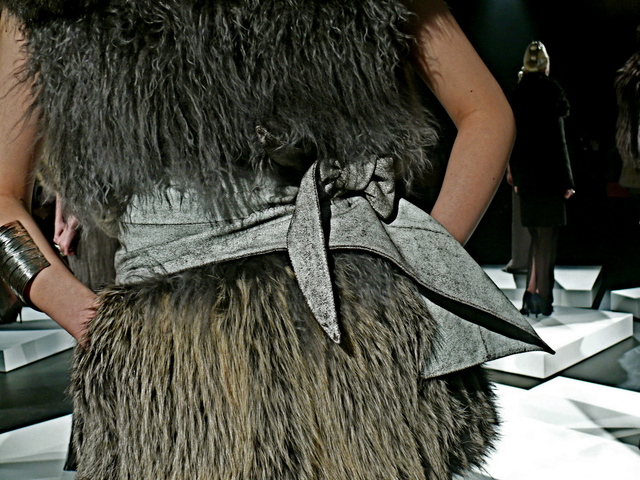 A detail of Yeon wearing Ozone dyed raccoon and Tibetan lamb gilet, blizzard cracked obi tie.