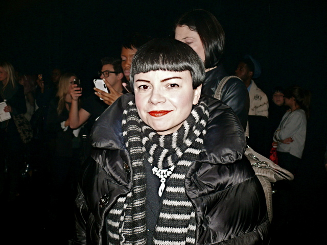 Author and fashion editor Julie Alvarez in her signature black and white look with coiled knits and a Louise Brooks style bob.