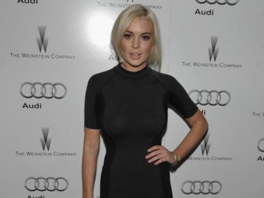 Lindsay Lohan spent the night crawling bars and restaurants with Christian LaBella.