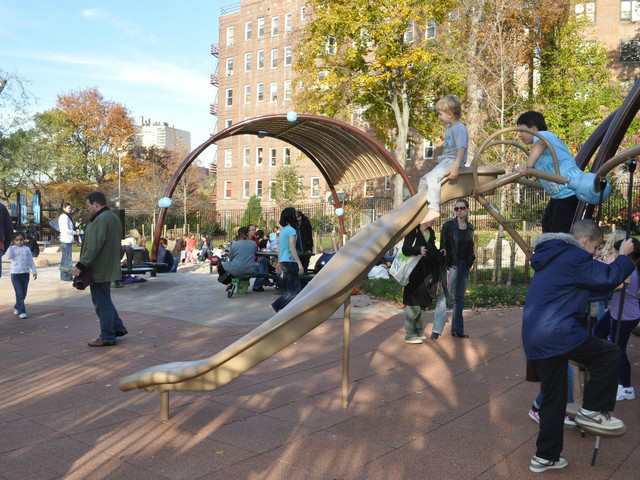 A child uses the recalled slide when it first opened in Indian Road Playground in Nov. 2010.