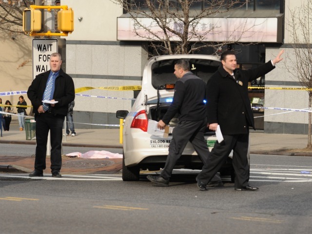 Investigator looked at the scene where a woman was killed on Feb. 22, 2012.