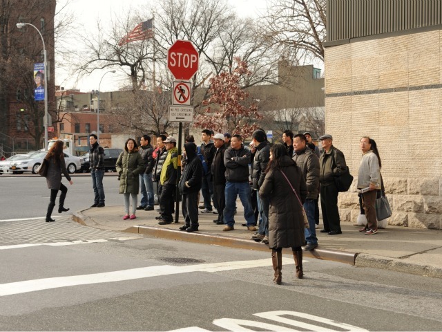 Witnesses looked on in the aftermath of a woman being struck and killed in Flushing on Feb. 22, 2012