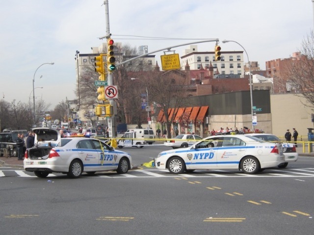 Cops responded to Northern Boulevard and Union Street after a city bus fatally struck a woman on Feb. 22, 2012.